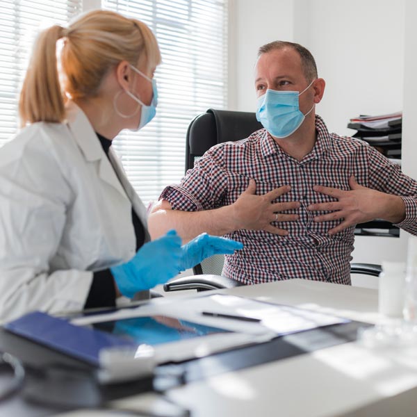 person talking to doctor